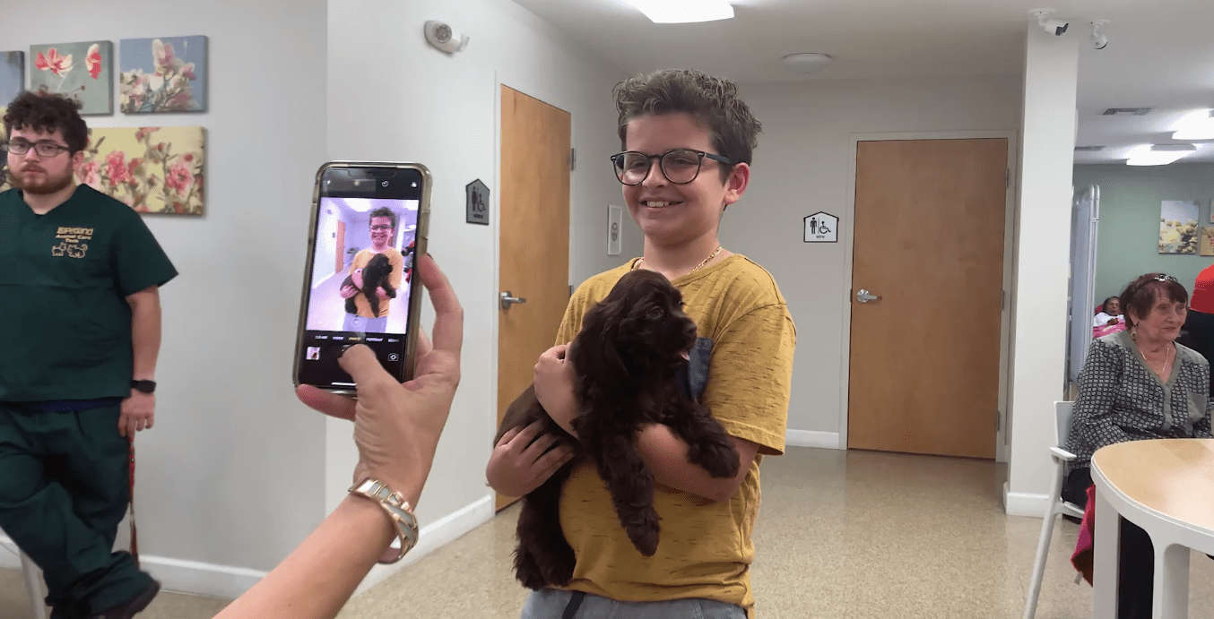 Petland Puppies Play with Patients at Day Care
